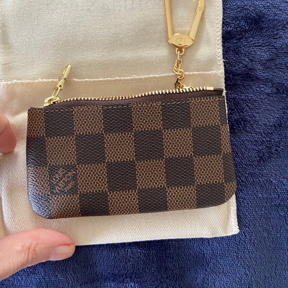 SOLD. Louis vitton pouch with key holder